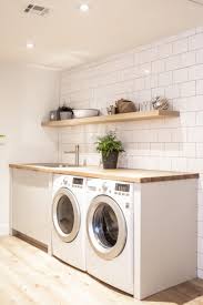 This laundry room from lexi westergard design has me dreaming of all of the stuff i could store this room is almost too beautiful to do laundry in! Modern Laundry Rooms That Will Make Laundry More Fun