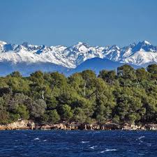 The Mercantour Mountains And Sainte Marguerite Island Seen From St Honorat Island France Natural Landmarks Mountains The Great Outdoors