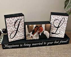 The man and woman are made using pebbles of different sizes and colour. Personalized Wedding Gifts Ideas And Unique Wedding Gifts