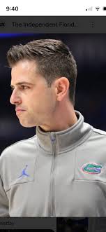Coaches Kelvin Sampson and Todd Golden in the National Championship Game