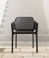 A Fiberglass Resin Chair With A Punched Pattern Design Milk Teak Outdoor Furniture Fiberglass Resin Furniture Design Chair