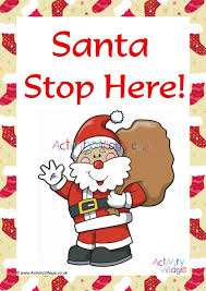 Christmas stop sign with santa stop here across the center and lights along the border. Santa Stop Here Sign