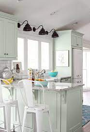 White kitchen cabinets with colorful kitchen island. 11 Small Kitchen Color Ideas For A Big Boost Of Style Better Homes Gardens