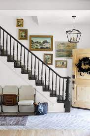 A collection of black and white artwork adds personality to this brand new home. 55 Best Staircase Ideas Top Ways To Decorate A Stairway