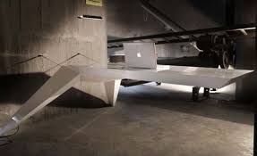 Standing or sitting, this desk is revolutionizing the work space. Futuristic Desk That Seems To Be Levitating