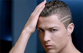 Cristiano ronaldo hairstyle 2012 sidecut with razored partning mens hair in. Top Cristiano Ronaldo Haircuts In Pictures Cristiano Ronaldo Haircut Ronaldo Hair Cristiano Ronaldo Hairstyle