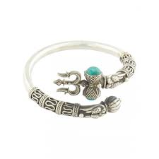 The sterling silver is made to last so he can love this bracelet for years to come. Designed Around An Exquisitely Shaped Trishul And Damroo With Turquoise Stones This Bea Silver Jewellery Indian Sterling Silver Bangles Mens Silver Jewelry