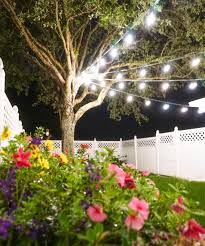 Brighten your backyard with these diy string light poles. How To Hang String Lights Diy Ashley Brooke Designs