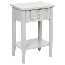 Une table de chevet imaginée par le studio made, dotée d'un tiroir et d'un compartiment ouvert pour un accès rapide. Table De Chevet Charme 67cm Gris Clair