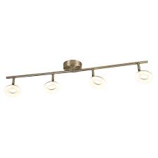 Ceiling lights mounted on the ceiling. Searchlight Donut Quirky Led Split Bar Ceiling Spotlight In Antique Brass Finish With Frosted Difuser 8904ab Lighting From The Home Lighting Centre Uk