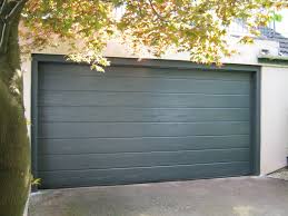 Hormann M Ribbed Sectional Garage Door In Woodgrain Anthracite Grey Garagedoor Garage Doors Wayne Dalton Garage Doors Sectional Garage Doors