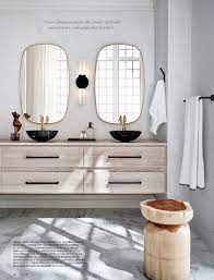 For a polished look in the en suite, bring in unique bath accessories. Cb2 February Catalog 2021 Infinity Brass Oblong Wall Mirror