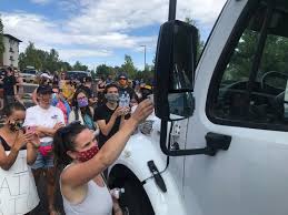 Central Oregonians stall ICE bus with impromptu protest - OPB