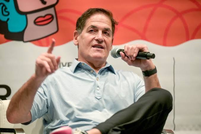 Mark Cuban speaking at a business conference.