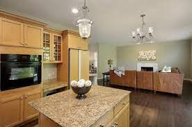 This kitchen, with its high ceilings and spacious floor plan, requires fixtures substantial. Kitchen Light Fixtures