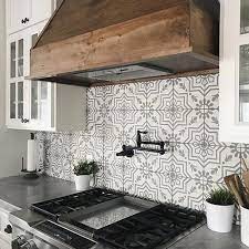 These tiles were painted with heat and the paint was being made from natural pigments. Cement Tile Shop Encaustic Cement Tile