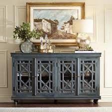A strong look in this sideboard due to its dark brown colour, but it still looks outstanding. A Decorating Style That Doesn T Get Dated The Inspired Room Dining Room Buffet Decor Buffet Decor Dining Room Buffet