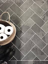 Slate herringbone tile floor is the right choice if you want to add a splash of contemporary styling to your décor. Black Slate Herringbone Tile Floor Transitional Laundry Room