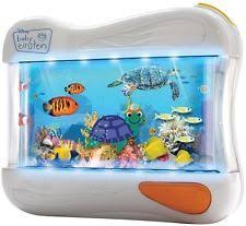 Baby Einstein Sea Ocean Aquarium Dreams Soother Crib Toy With Lights And Music Baby Einstein Toys Baby Einstein Crib Toys