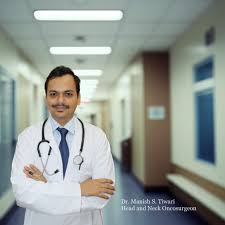 About Dr. Manish S. Tiwari