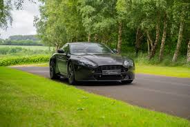 Image result for Marron Black 2017 Aston Martin