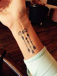 The delicate arrow design on cobain's wrist is a little more. Girls Initials And Arrow Tattoo On Wrist Arrow Tattoo On Wrist Wrist Tattoos For Women Tattoos For Women