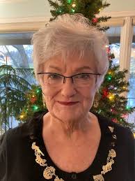 Gloria "Glo" Janice Heuschkel