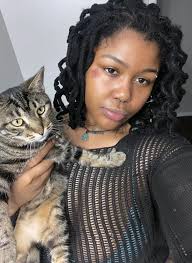 Cat Mimics Owner's Behavior in Front of Mirror