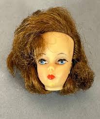 Is the Mitzi doll case authentic?