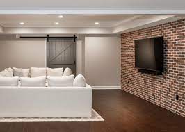 Rustic elegant interior exposed brick wall. Green Basements On Twitter Brick Accent Wall For The Win Teamgreen Greenbasementsandremodeling Atlantaconstruction Roswellremodel Basement Brickaccentwall Basementlivingroom Barndoor Https T Co Szalz0sawm