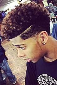 The long black curly hair spreads to all the sides, forming unique look. Sexy Short Hairstyles For Women Haircuts For Men 50 Best Haircuts For Black Men Cool Black Guy Hairstyles For Haircuts For Black Mens Curly Hair This