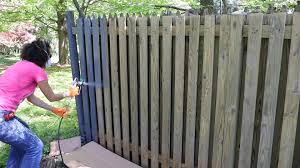 Painting A Fence With A Paint Sprayer Wagner Spraytech In 2020 Using A Paint Sprayer Paint Sprayer Wood Fence