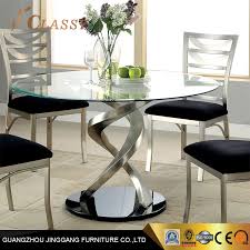 Set of 4 chairs sold separately for $175. Round Glass Top Dining Table With High Gloss Stainless Steel Finish Base China Dining Furniture Home Furniture Made In China Com