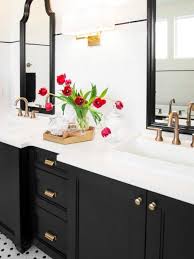Black And White Vanity Ideas 8 Black Bathroom Cabinet Ideas That You Ll Want To Copy Now Hunker White Bathroom Tiles Black Cabinets Bathroom Classic Bathroom