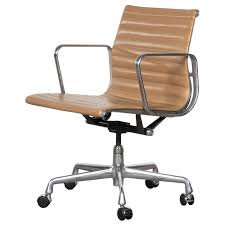 If you mainly want a chair that props you up ergonomically and is comfortable for long hours of typing at a desk, the aeron will suit you well. Eames Management Office Chair In Cognac Leather For Herman Miller Usa At 1stdibs