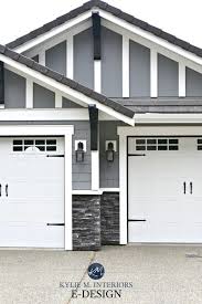 Black And White House With Wood Garage Door Gray And White Home Marble Dark Wood And More Gray House Exterior Grey Exterior House Colors House Paint Exterior