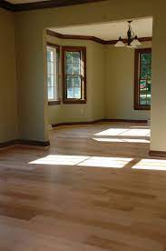Contrasting Appalachian Maple With Dark Trim Makes A Dramatic Effect The Light Hues Of Maple Give Alternative Floor Trim Dark Wood Trim Hardwood Floor Colors