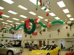 Another great outdoor decor idea for this christmas is a ridiculously large wooden snowflake with lights. 22 Auto Showrooms Ideas Balloon Decorations Balloons Balloon Cars