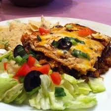 This 5 ingredient casserole is layers of chicken, cheese, tortillas and beans, all baked together into a hearty meal. Layered Chicken And Black Bean Enchilada Casserole Recipe Allrecipes