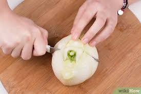 If the stalks are still attached to your bulb of fennel, cut them away close to where they connect to the bulb. How To Cut Fennel With Pictures Wikihow