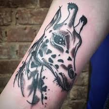Giraffe tattoo with heart symbol on chest. 15 Giraffe Tattoo Designs Ideas Design Trends Premium Psd Vector Downloads