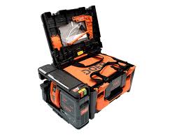 Stellen S Doer Kit Packs A Dozen Power Tools Inside A Single Compact Storage Box It Includes A Hammer Drill Drill Pre Tool Box Tool Sheds Portable Workbench