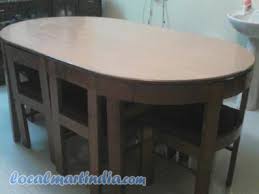 You always have space for the coffee table so this is a great place to hide your dining table. Dining Table With Hidden Chairs Home Decoration