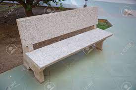 Campania international classic garden cast stone backless garden bench. Stone Bench Covered With Marble Chips Isolated On A Park Background Stock Photo Picture And Royalty Free Image Image 135225535