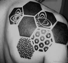 Angel playing football tattoo on right back shoulder. 37 Magnifying Geometric Shoulder Tattoos
