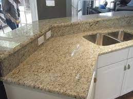Giallo ornamental granite countertops in combination with the right. Giallo Ornamental Granite Exceptional For White Cabinets Traditional Kitchen Charlotte By Fireplace Granite Distributors Houzz