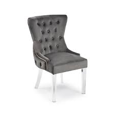 The path is a contemporary dining chair with a sculptural and elegant design. Knightsbridge Grey Velvet Upholstered Dining Room Chair Button Tufted Grosvenor Furniture