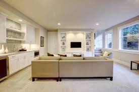 Exposed ceiling studs or plywood walls are concrete or painted concrete rather than drywall/sheetrock 4 Pros Of Buying A House With An Unfinished Basement Anne Cohen Writes