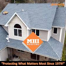 Example of a classic exterior home design in other. Mhi Roofing Gaf Timberline Hdz Biscayne Blue We Do Facebook