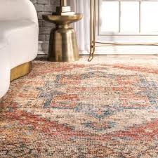 Make sure the rug is big enough for the furniture to sit on it, with armchairs in the group having their front legs on the edge and your coffee table centred. Nuloom Mya Flatweave Multi 9 Ft 6 In X 13 Ft 6 In Area Rug Svin08a 10014 The Home Depot Vintage Rug Living Room Area Rugs Rugs